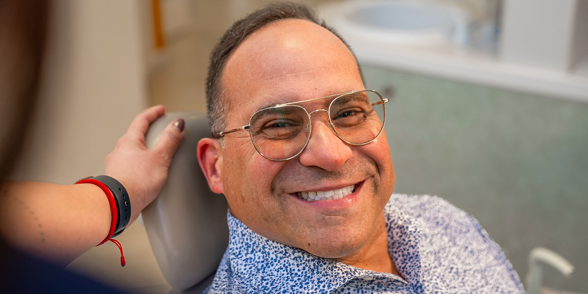 patient smiling brightly after their dental procedure