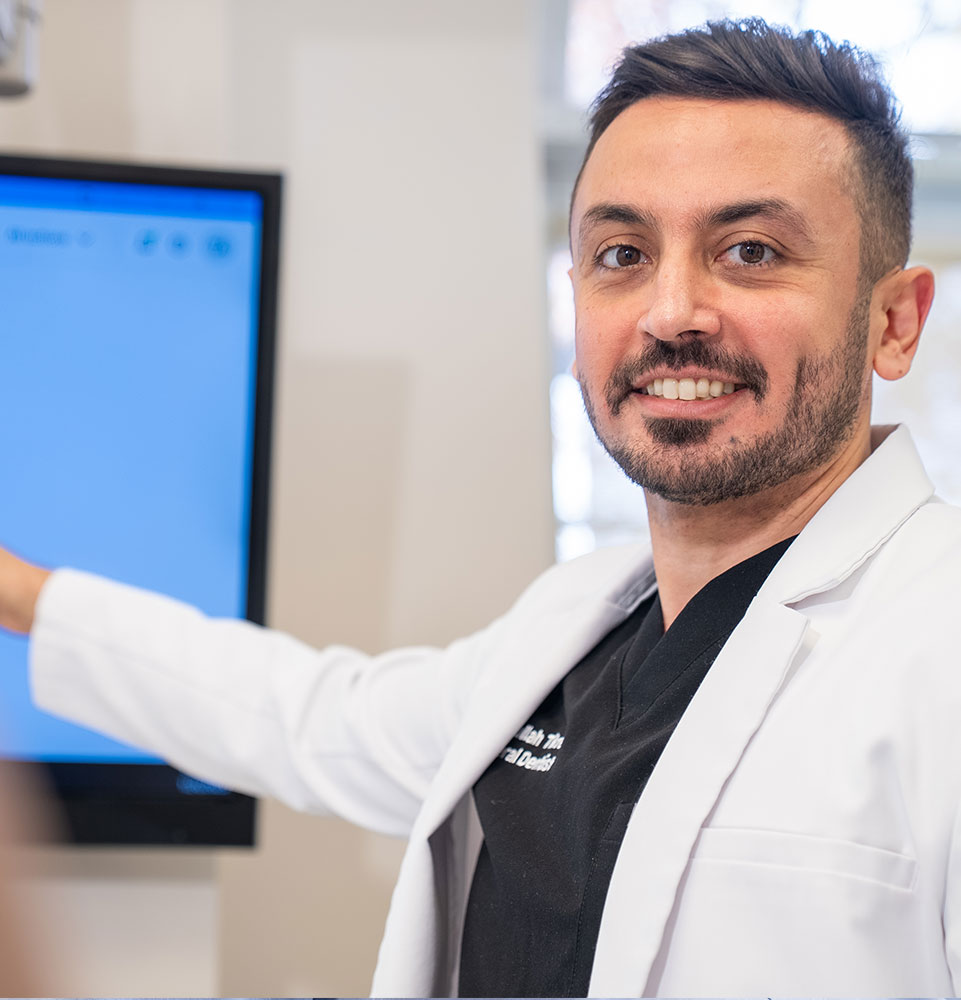 doctor showing patient dental details for their dental treatment