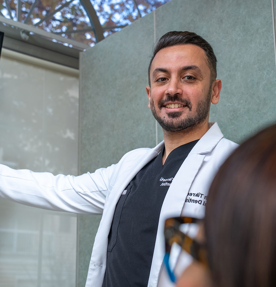 doctor going over dental procedure information