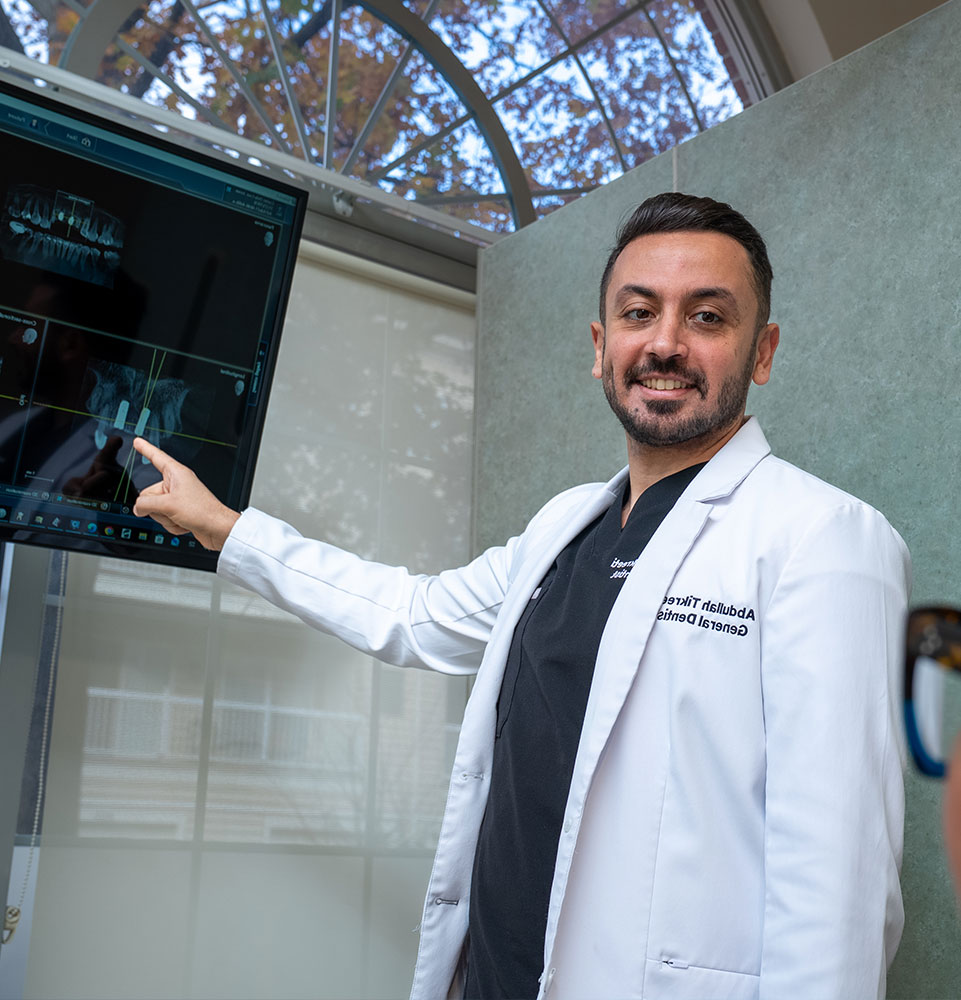 doctor going over dental procedure information