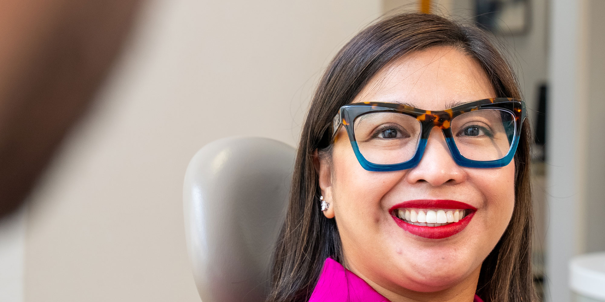 patient smiling brightly after their dental treatment