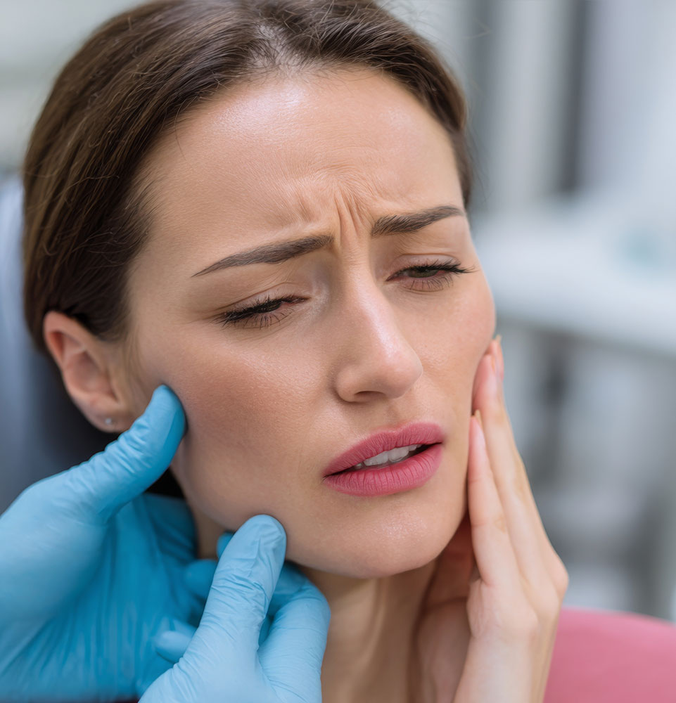 close up of female experiencing mouth pain